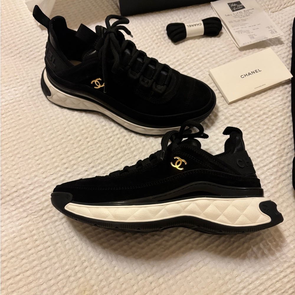 CHANEL Black and White Athletic Shoes with Gold Logo
